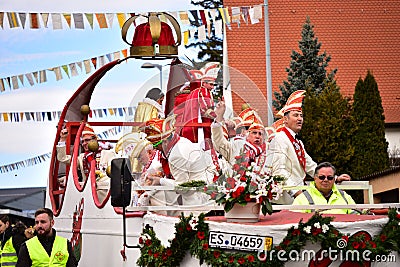 Group of people dressed in festive costumes celebrating the Fasching carnival parade in Germany Editorial Stock Photo