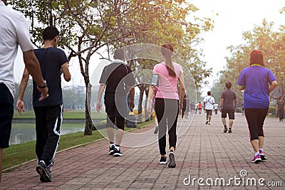 Group of people exercise walking in the park Editorial Stock Photo