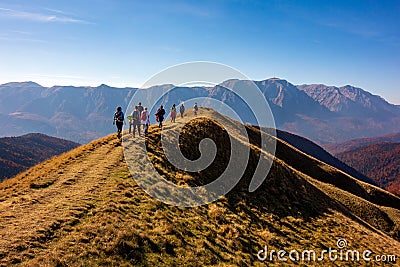 Group of people hiking in the mountains during autumn season Editorial Stock Photo