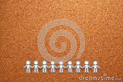 Group of people holding hands on bulletin board. Teamwork concept. Stock Photo