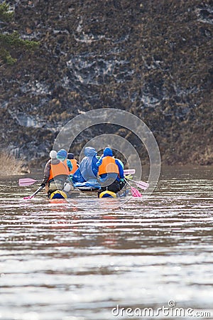 Group of people on the inflatable catamarans rafting on the river Stock Photo