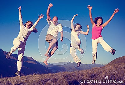 Group People Jumping Happines Outdoors Concept Stock Photo