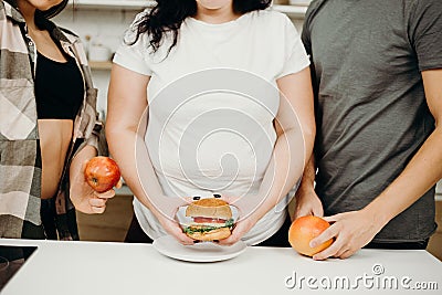 Group of people with junk and proper food Stock Photo