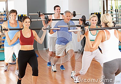 Group Of People Lifting Weights Stock Photo