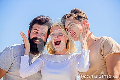 Group of people outdoor. heaven concept. success heights. happy woman and two men. cheerful friends. friendship Stock Photo