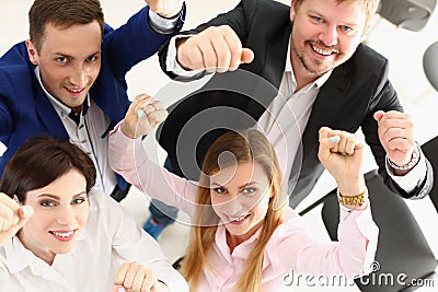 Group of people show support gesture collectively in office Stock Photo