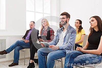 Group of people sitting at seminar, copy space Stock Photo
