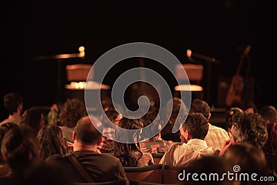 Group of people sitting in a theater Editorial Stock Photo