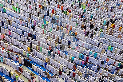 many people are standing in line and forming a small mosque Editorial Stock Photo