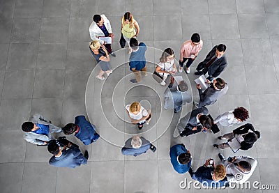 Large group of people standing and talking on business meeting in the company Stock Photo