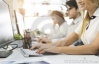 Group of people working on computers close up Stock Photo