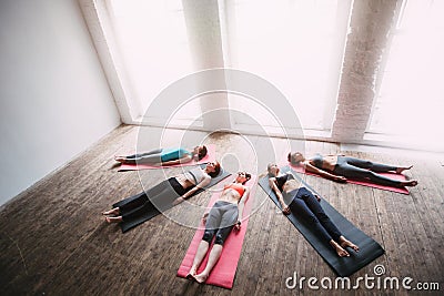 Group perfect figure women yoga relax after a workout. Stock Photo