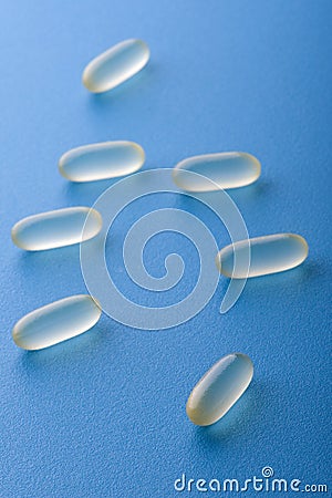 Group pill on blue Stock Photo