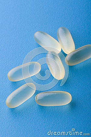 Group pill on blue macro Stock Photo