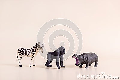 Group of plastic toy animals, Elephant, Tiger, Lion and Cheetah - Miniature plastic toy animals Stock Photo