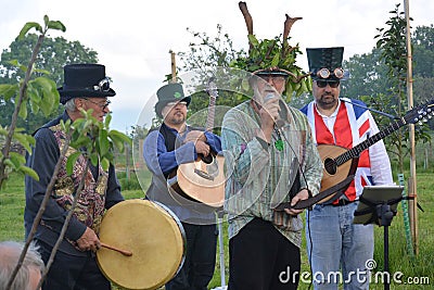 Group playing at a wassail Editorial Stock Photo
