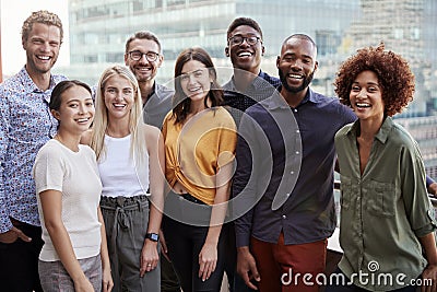 Group portrait of a creative business team standing outdoors, three quarter length, close up Stock Photo