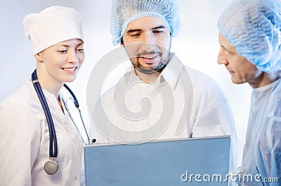 Group portrait of medical doctors standing in hospital Stock Photo