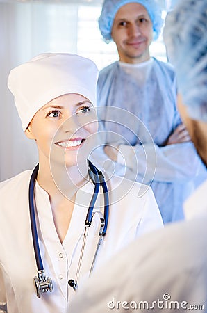 Group portrait of medical doctors standing in hospital Stock Photo