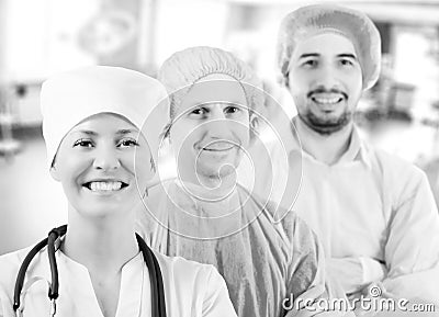 Group portrait of medical doctors standing in hospital Stock Photo