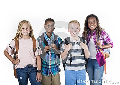 Group portrait of pre-adolescent school kids smiling on a white background Stock Photo