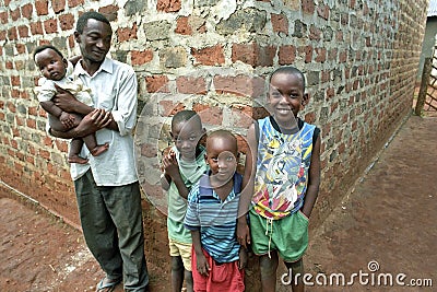 Group portrait Ugandan family, father and children Editorial Stock Photo