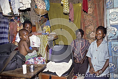 Group portrait of Ugandan family in living room Editorial Stock Photo