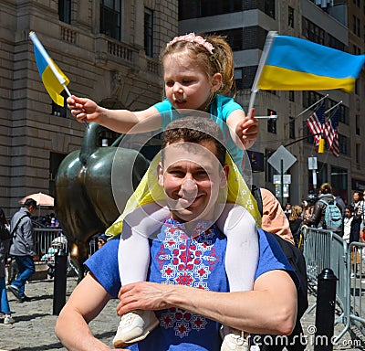 Group of protestants gathered at Bowling Green Park in New York City showing Solidarity with Ukraine Editorial Stock Photo