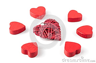 Group or red hearts isolated on white, six wooden and one strawy Stock Photo