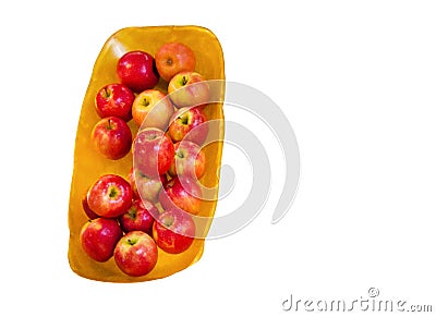 The group of Red pink lady apple Cripps Pink on a brown wooden tray, isolated on white background. Stock Photo