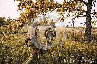 Group Of Reenactors Men Dressed As Russian Soviet Red Army Infantry Soldiers Of World War II Marching In Autumn Editorial Stock Photo