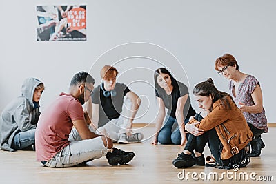 Teenagers in a circle Stock Photo