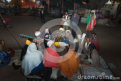 Group of Sadhus play in local musical instruments in Orchha Editorial Stock Photo