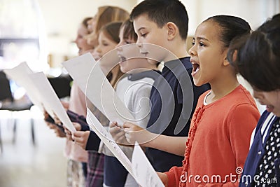 Group Of School Children Singing In Choir Together Stock Photo