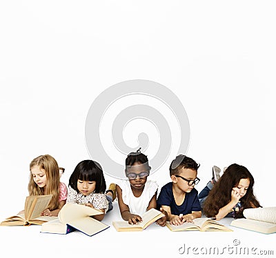 Group of school kids reading for education Stock Photo