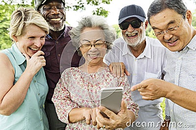 Group Of Senior Retirement Using Digital Lifestyle Concept Stock Photo