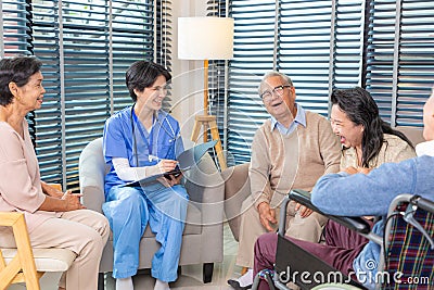 Group of Seniors visiting nursing telling happy healthy about health complaints, Nurse writing personal information Stock Photo