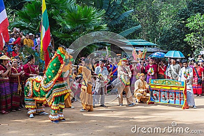 Group of Shan or Tai Yai ethnic group living in parts of Myanmar and Thailand in tribal dress do native dancing in Shan New Year Editorial Stock Photo