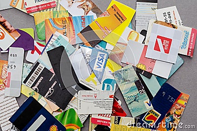 Group of shredded credit cards, business cards and discount card Editorial Stock Photo