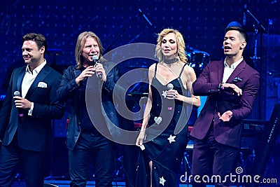 Group of singers performs on stage during the Viktor Drobysh 50th year birthday concert at Barclay Center Editorial Stock Photo