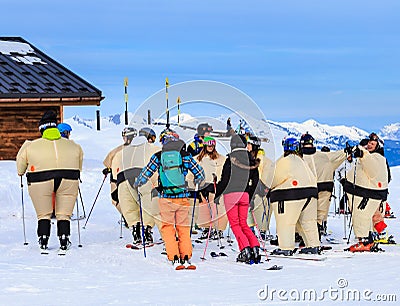 Group of skiers in the inflatable costumes. Valley Val Thorens Editorial Stock Photo