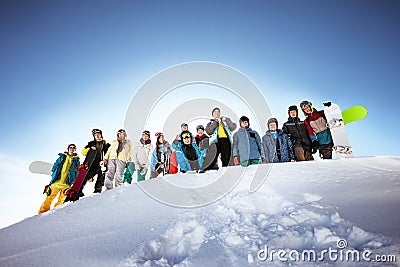 Group of skiers and snowboarders Stock Photo