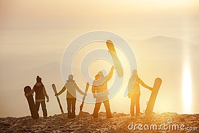 Group skiers snowboarders ski resort concept Stock Photo