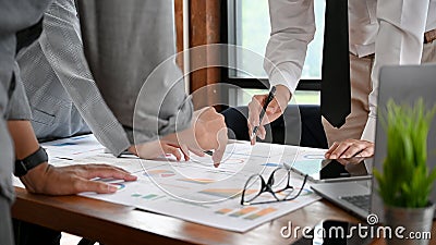 A group of a smart and successful Asian male banker working together Stock Photo