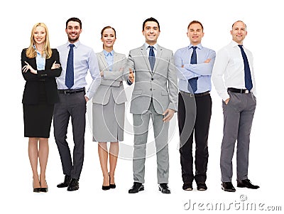 Group of smiling businessmen making handshake Stock Photo