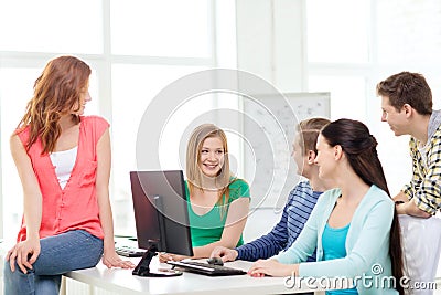 Group of smiling students having discussion Stock Photo