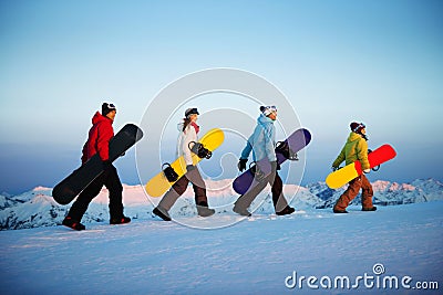 Group of Snowboarders Extreme Skiing Concept Stock Photo