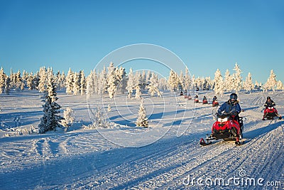 Group of snowmobiles in Lapland, near Saariselka Finland Stock Photo