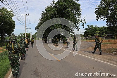 A group of soldiers walking on the road, drills, hiking, outdoor Editorial Stock Photo