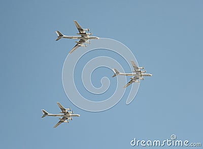 The group of Soviet strategic bomber Tupolev Tu-95 `Bear` flies over Red Square. Dress rehearsal of the Victory Day parade on Red Stock Photo